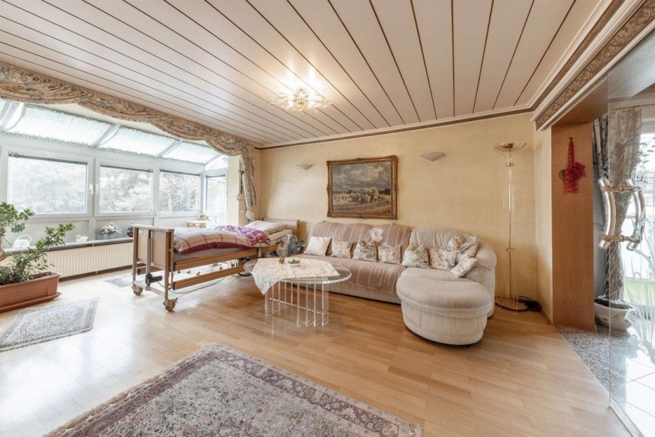 Obergeschoss Wohnzimmer mit Wintergarten Zweifamilienhaus Vaterstetten